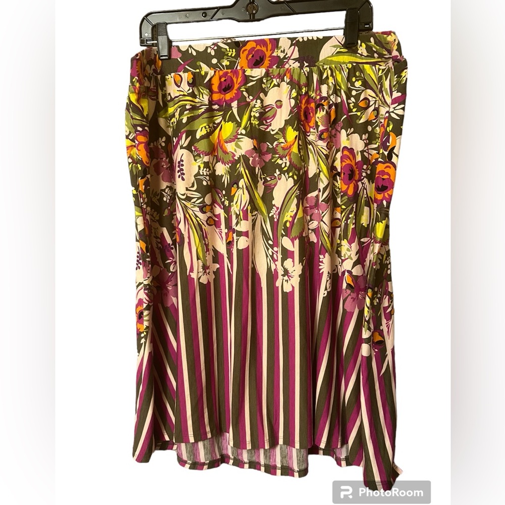 Two skirts floral Aline and paisley lined handkerchief hem.